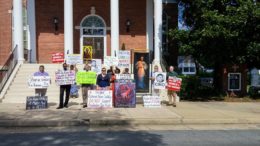 KAINE CHURCH PROTEST FRONT STEPS