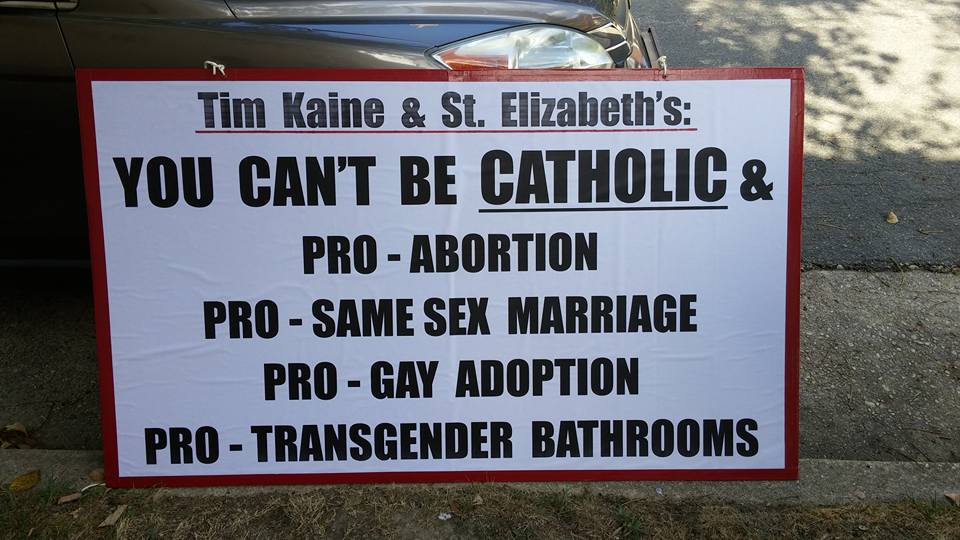 KAINE CHURCH PROTEST SIGN CATHOLIC BELIEFS