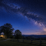 Milky Way over rural Virginia farmhouse at twilight