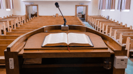 An open Bible on a pulpit — the most political book on earth